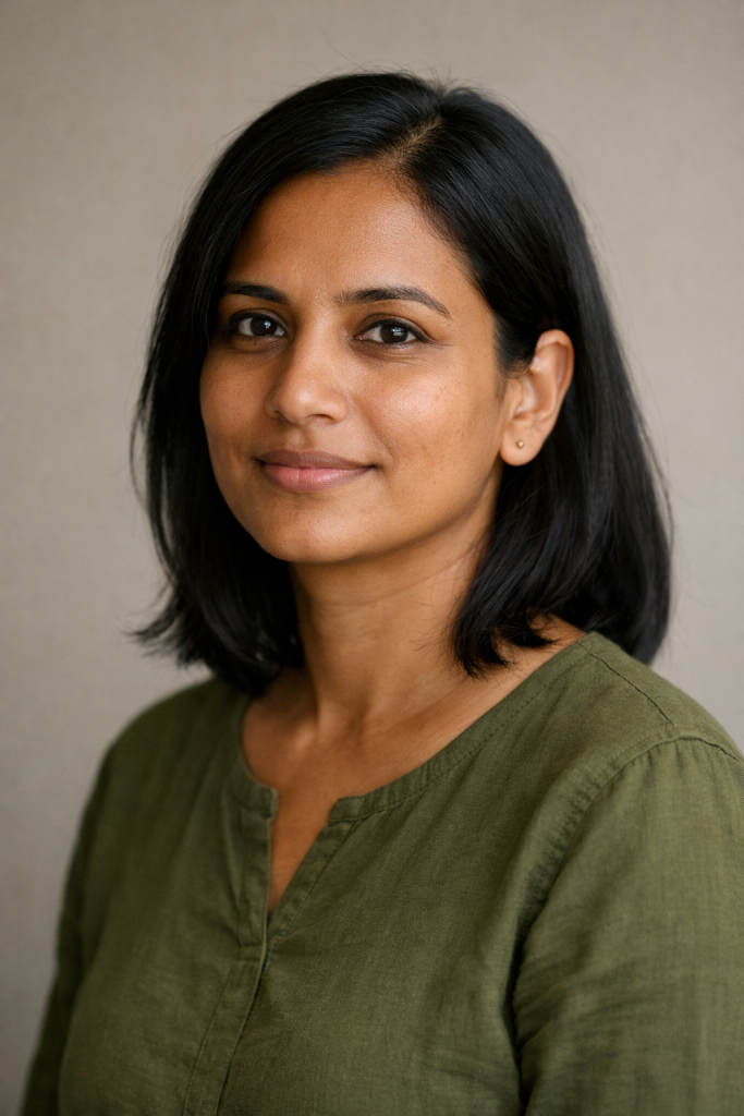 AI-generated portrait of a smiling South Asian woman in an olive-green top, created with ChatGPT 1.5 for Dzinepixel’s AI image-generation comparison with Grok Imagine, FLUX 2 Pro, and Nano Banana 2 Lite